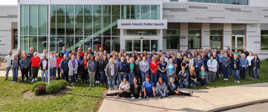 A photo of all staff in front of the Lorain County Public Health building 