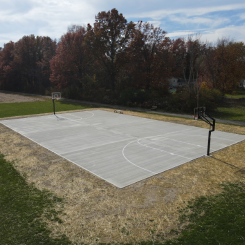 an aerial view of an outdoor basketball court
