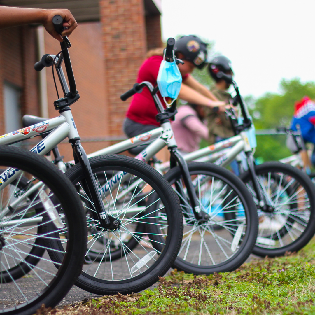 Student bikes lined up outside.